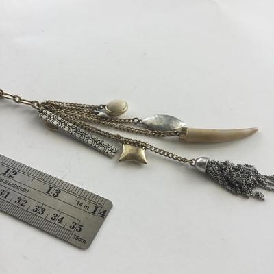 Shamrock marked tassel chain type long necklace