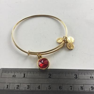 Gold tone charm bracelet