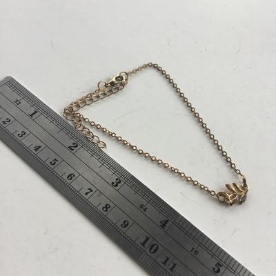 Gold tone leaf like bracelet