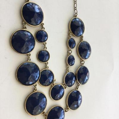 Gold tone blue statement necklace
