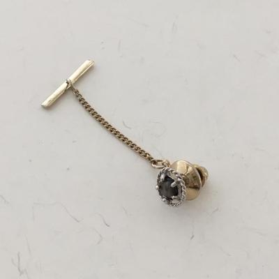 Gold tone unmarked push pin