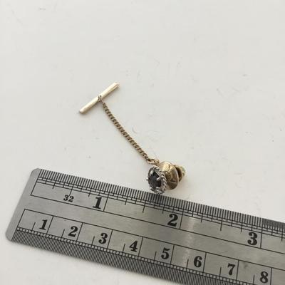 Gold tone unmarked push pin