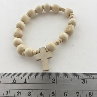 White beaded stretchy cross bracelet