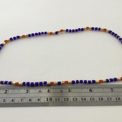 Gold tone blue and orange fashion necklace