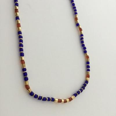 Gold tone blue and orange fashion necklace