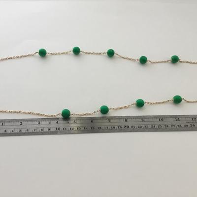 Gold tone green fashion necklace