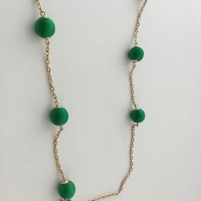 Gold tone green fashion necklace