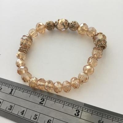 Beautiful champagne color beaded stretchy bracelet