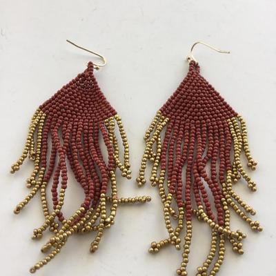 Red gold tone dangle beaded earrings