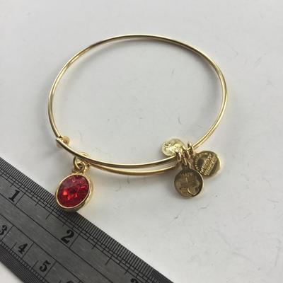 Gold tone charm bracelet