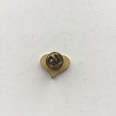 Gold tone unmarked heart push pin