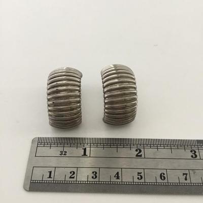 Silver tone clip on statement earrings