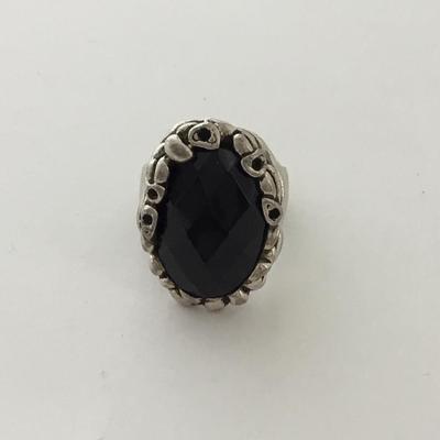 Unmarked black center silver tone ring