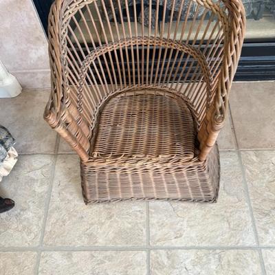 Handmade Knitting Grandma sitting on antique kids wicker potty chair
