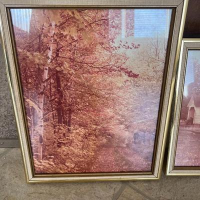 Framed art with red ink pictures