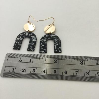 Gold tone black fashion earrings