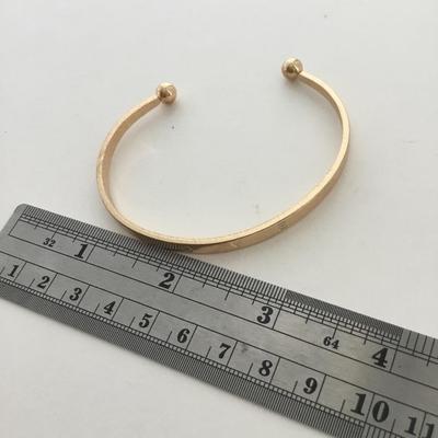 Gold tone love fashion cuff bracelet