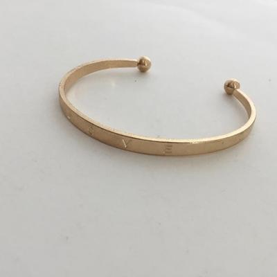 Gold tone love fashion cuff bracelet