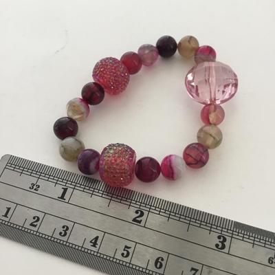 Pink and purple tone stretchy beaded fashion bracelet