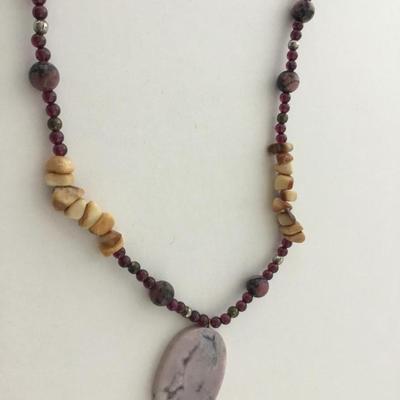 Beautiful unique beaded stone type pendant necklace