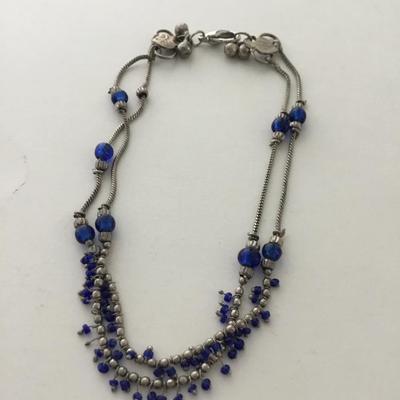 Marked silver tone blue fashion bracelet