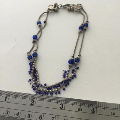 Marked silver tone blue fashion bracelet
