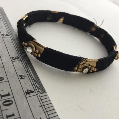 Gold tone unmarked bangle bracelet