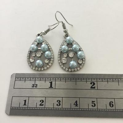 Silver tone blue dangle earrings
