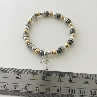 Unmarked cross beaded stretchy bracelet