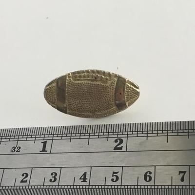 Gold tone vintage football pin