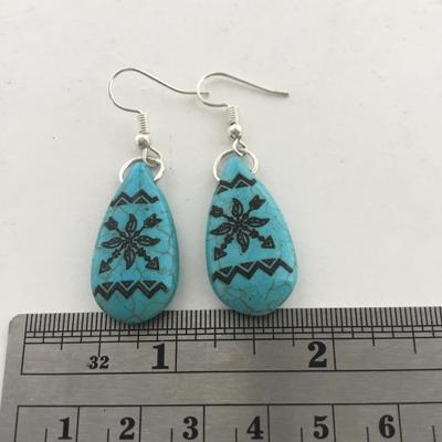 Silver tone blue fashion earrings