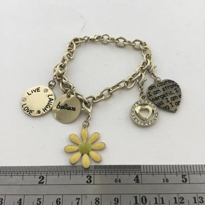 Gold tone charm fashion bracelet