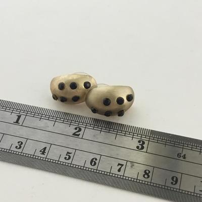 Gold tone statement earrings