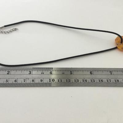 Unmarked cord type fashion necklace