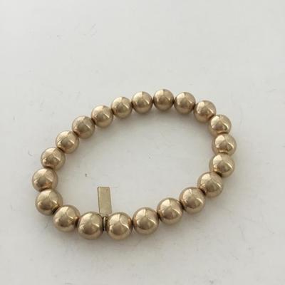 Marked gold tone beaded stretchy bracelet