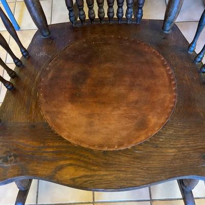 Antique Oak Rocking Chair with a Pressed Back and Leather seating Surface
