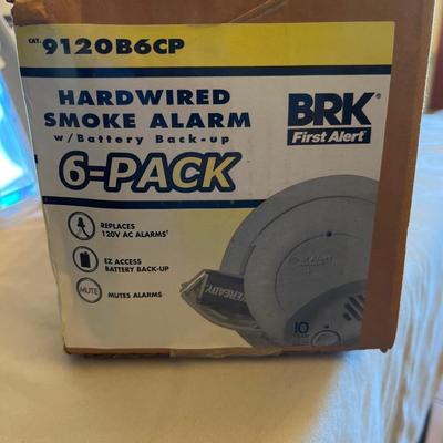 Hardwired smoke alarms with battery backup. 6 pack