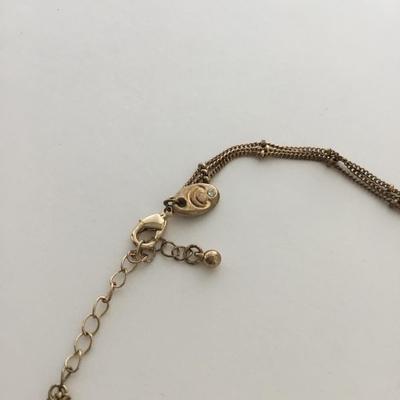 Gold tone fashion necklace C marked