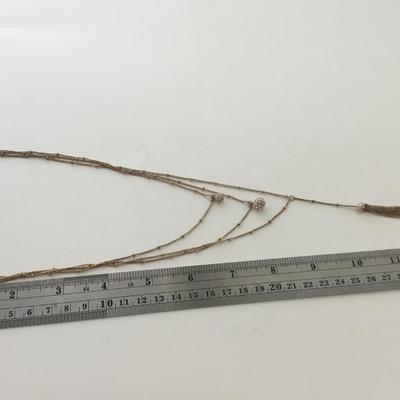 Gold tone fashion necklace C marked