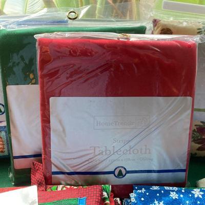 Various tablecloths,, napkins. Many new!