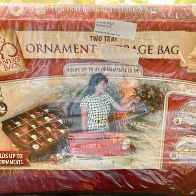 Books (3) and ornament storage bags