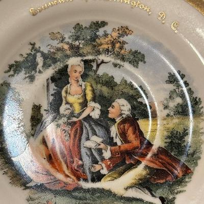 Miniature 2 Saucers and Teacup (with chip)