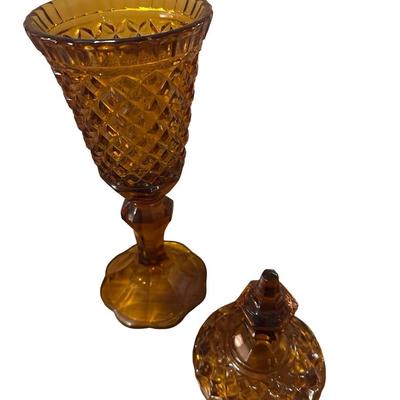Tall, brown glass lidded Jar