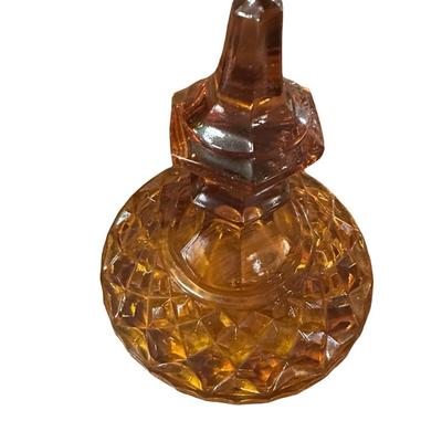 Tall, brown glass lidded Jar