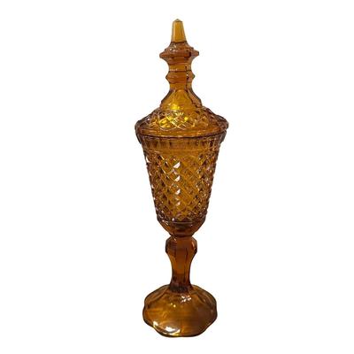 Tall, brown glass lidded Jar