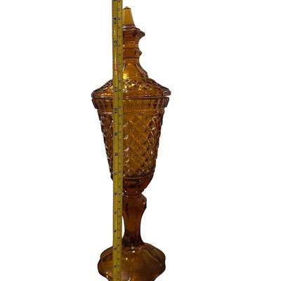 Tall, brown glass lidded Jar