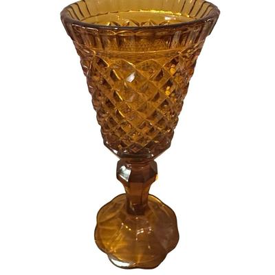 Tall, brown glass lidded Jar