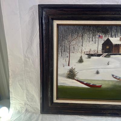 Real Wood Frame with burlap mesh framing a Winter Log cabin in the snowy forest