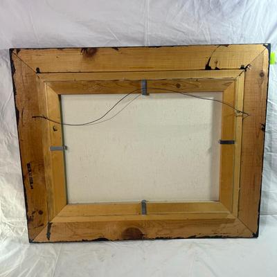 Real Wood Frame with burlap mesh framing a Winter Log cabin in the snowy forest