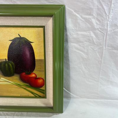 Bright green painted wood frame with oil painting of veggies